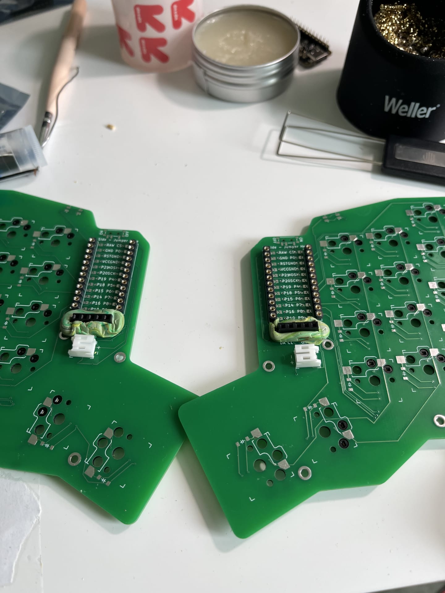 Photo of the controller being held on the pcb with clay