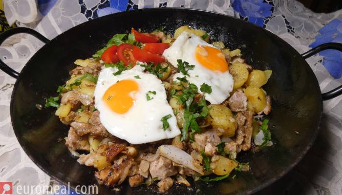 Bratengröstl - potatoes and meat fried in the pan
