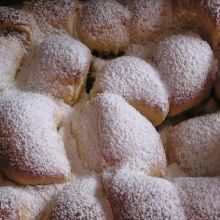 mit Zucker bestreuen