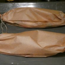 in das Backpapier einpacken