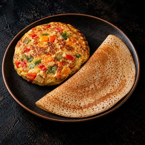 Spanish Omellet With Veggies And Wheat Dosa — Veg breakfast from Edibles, Kochi