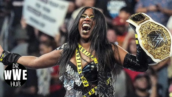 WWE’s Naomi Announces Pregnancy, Vacates Women’s World Championship
