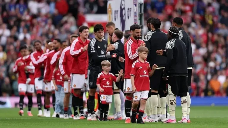 Sons of Fallen Police Officer Lead Manchester United Out in Emotional Tribute