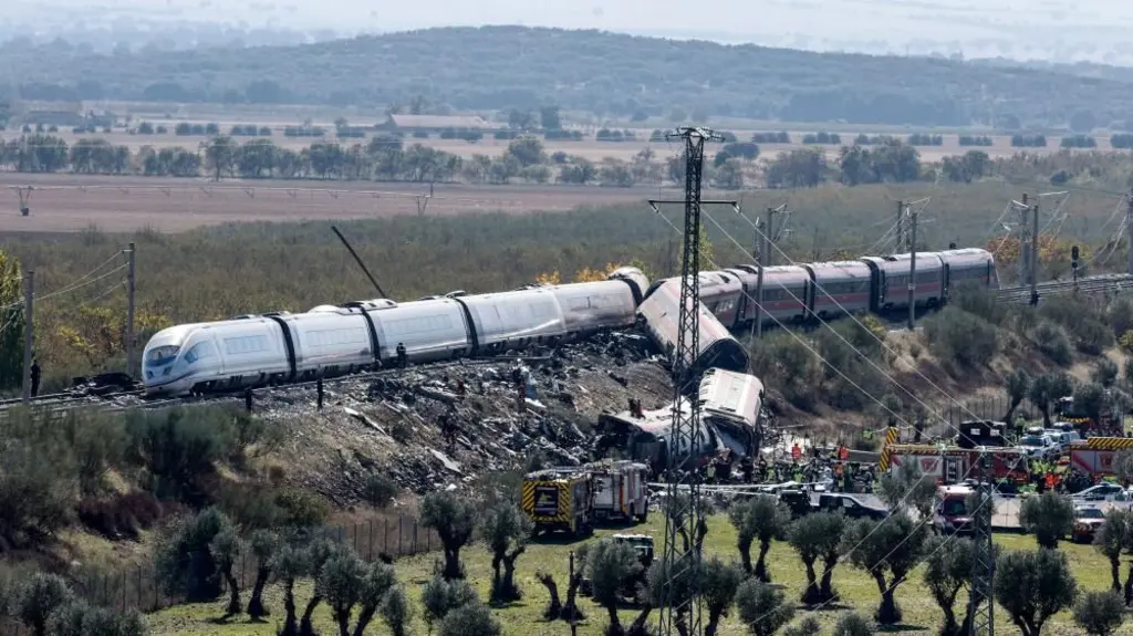 Families desperate for news as rescuers work to identify Spanish train crash victims