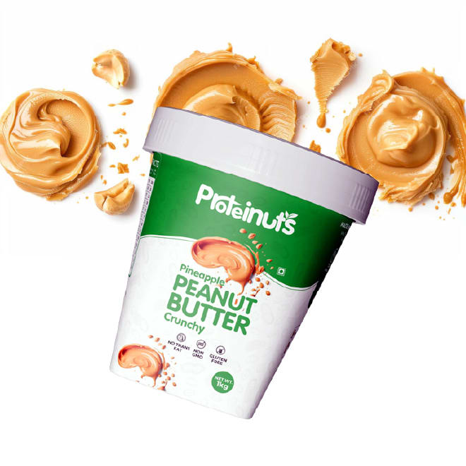 Proteinuts pineapple crunchy peanut butter tub in a splash