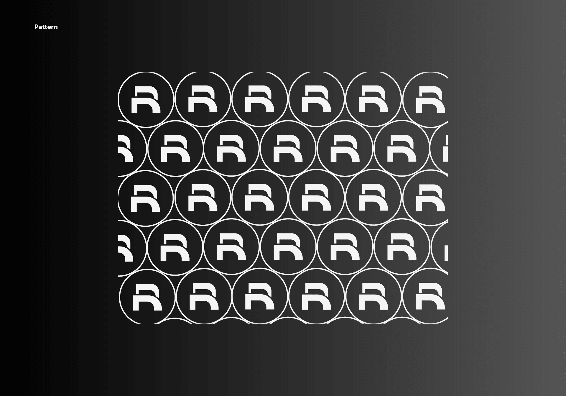 Kursii R-monogram repeat pattern in black and white