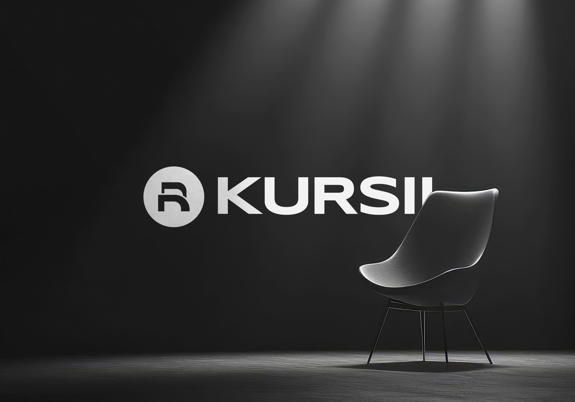 Kursii logo lit on a dark stage beside a designer chair
