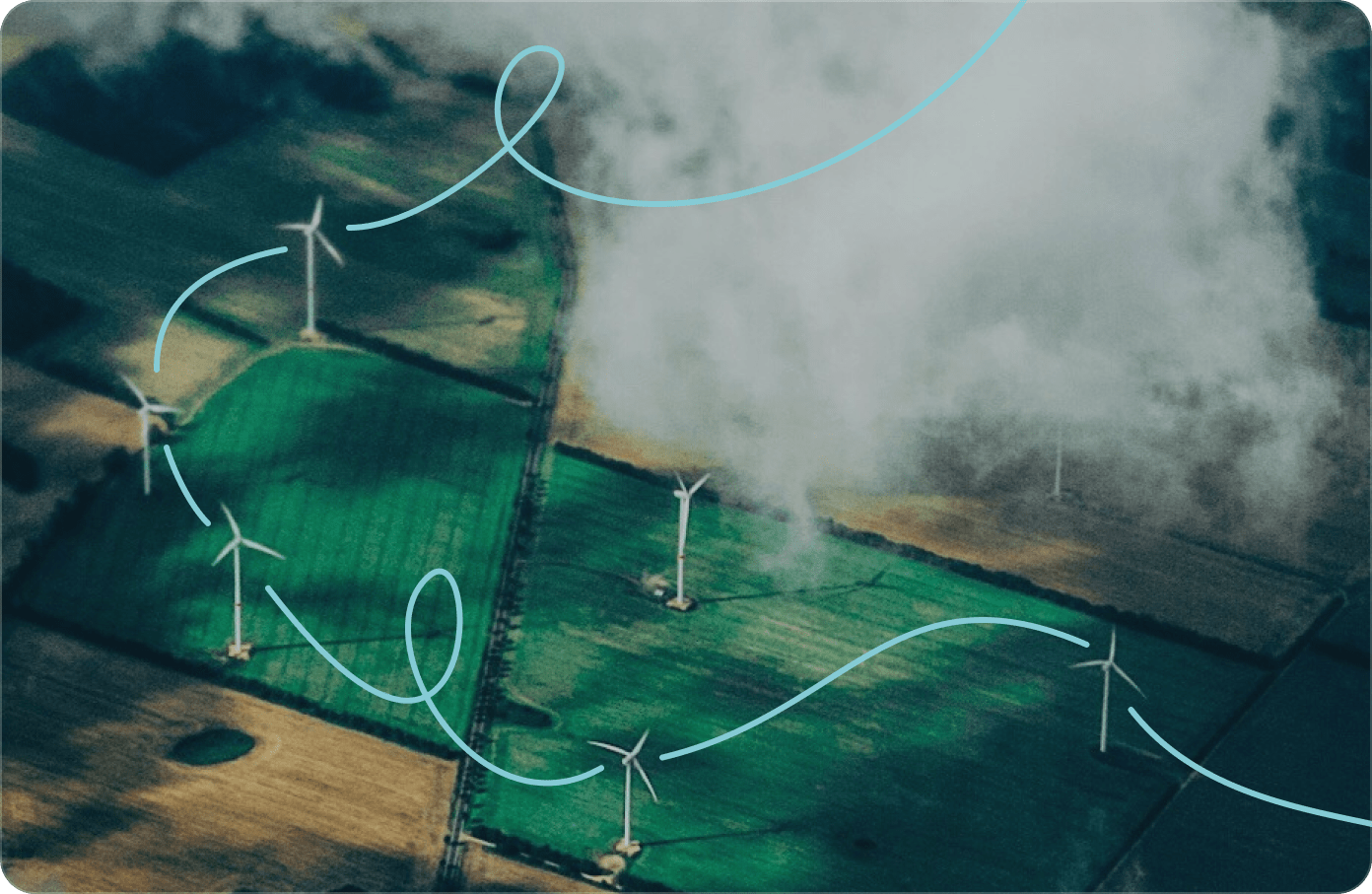 An aerial view of a green field with wind turbines and a digital ribbon connecting them.