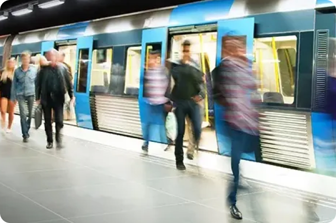 People entering and exiting a subway car