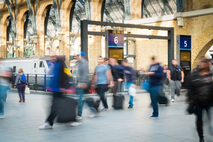 Time lapse of people entering and exiting a train station