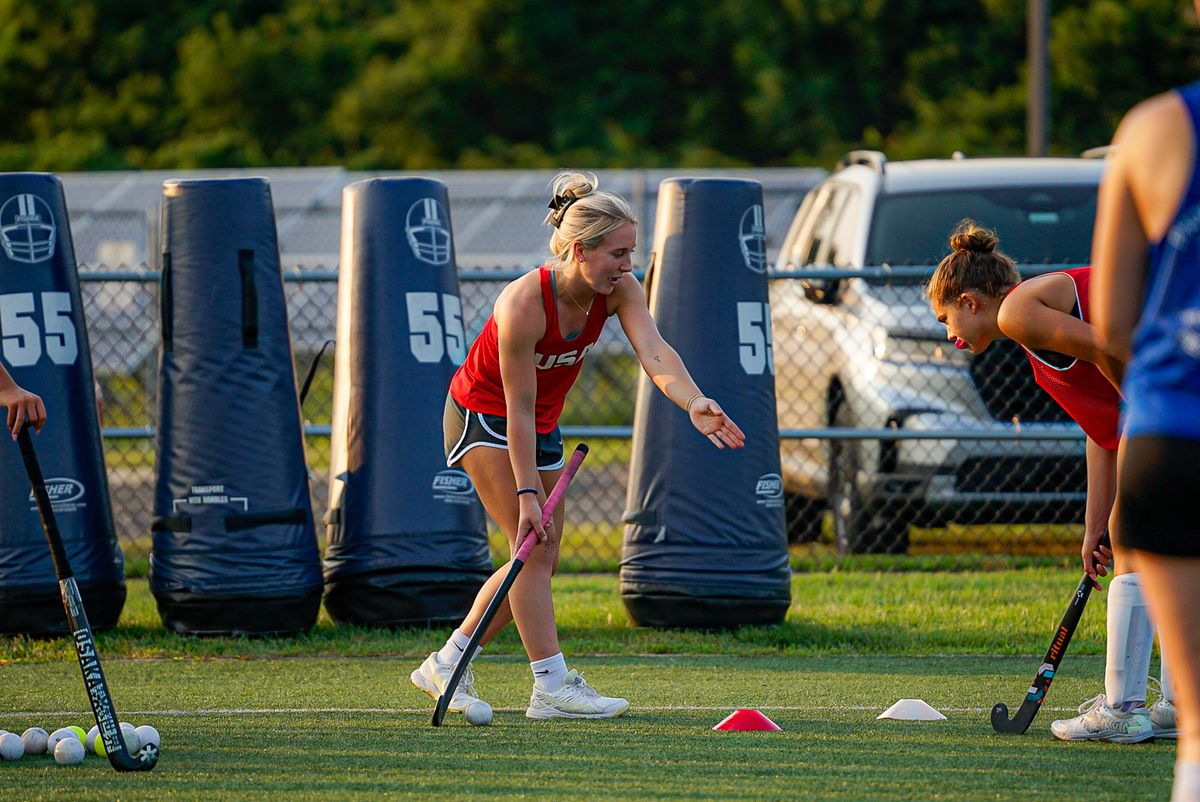Phia coaching on the field