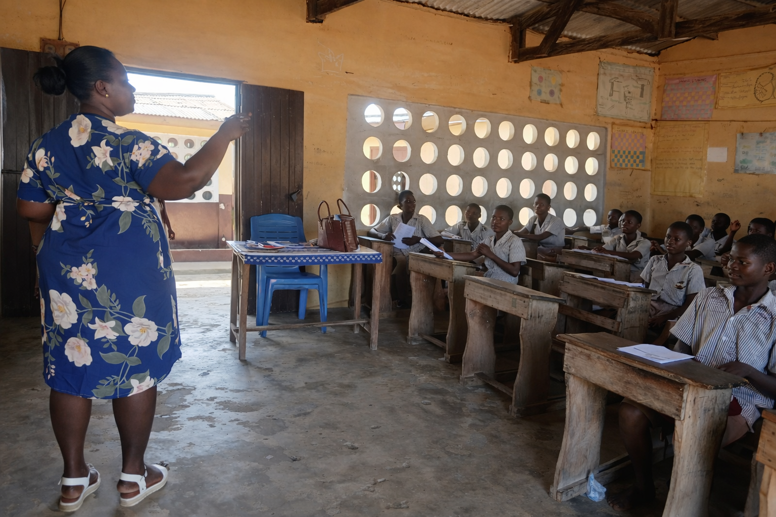 Teacher engaging with students in class