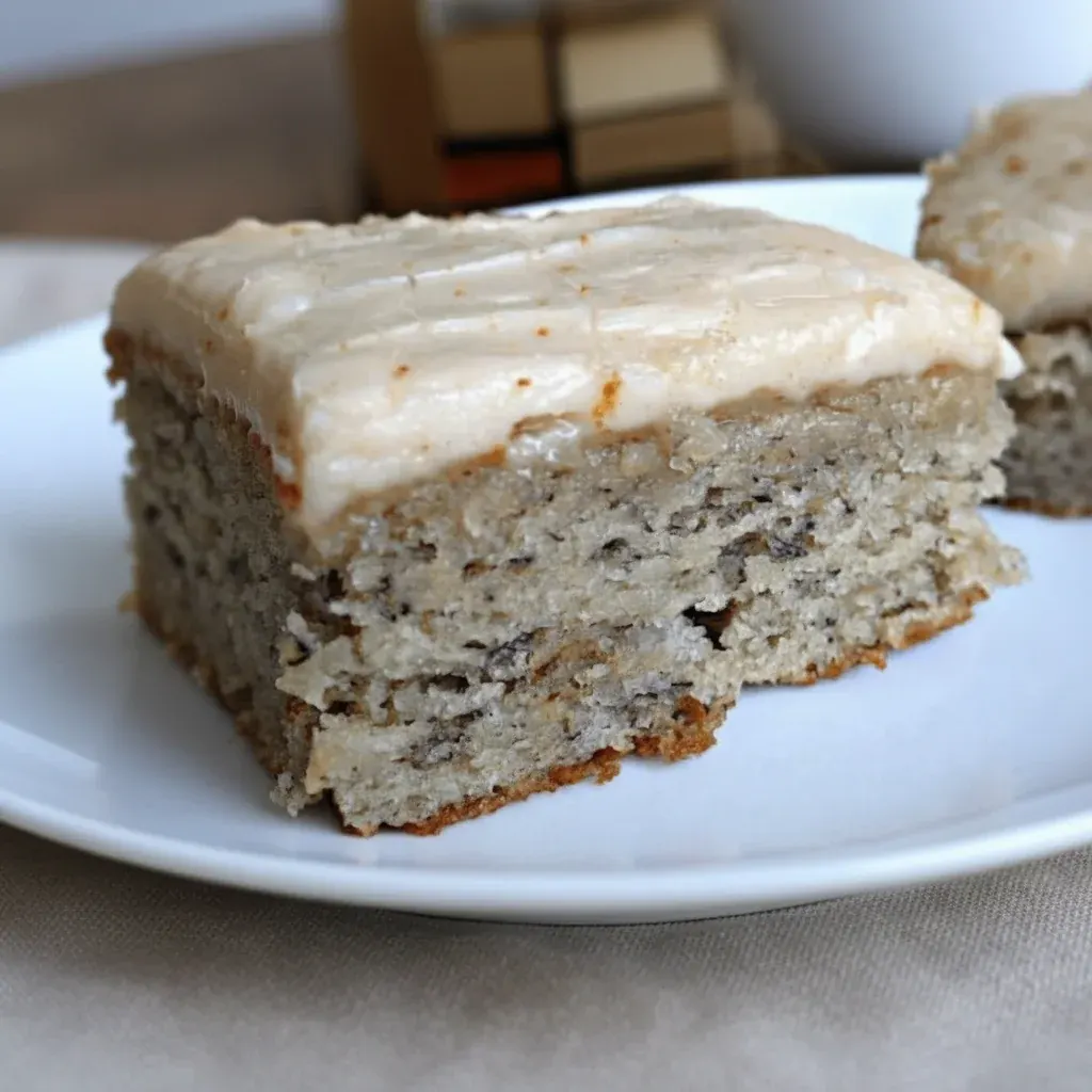 A plate of freshly baked fudgy banana bread brownies cut into squares.
