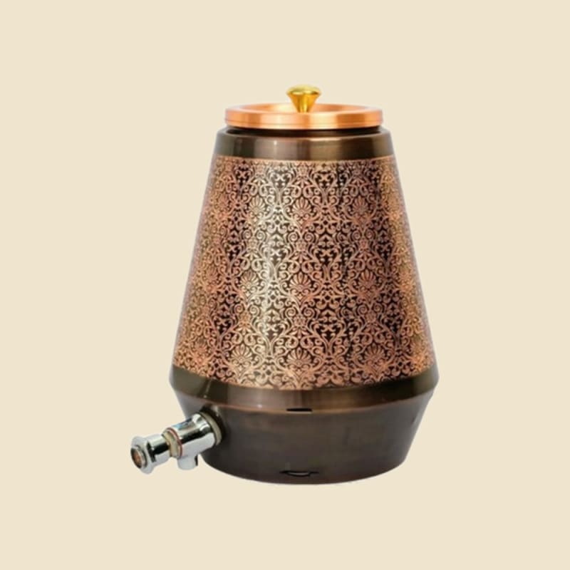 Antique and Etched Copper Water Dispenser on a warm ivory background