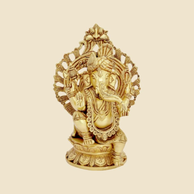 Brass Ganesha with Ornate Arch, Light Finish on a warm ivory background