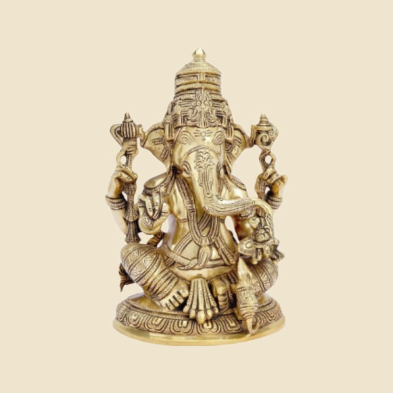 Brass Ganesha with Tall Crown and Mouse on a warm ivory background