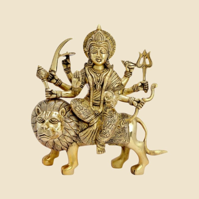 Brass Durga on Lion, Detailed Antique on a warm ivory background