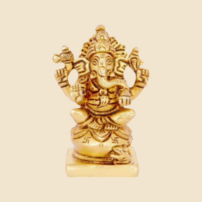 Brass Ganesha with Mouse on Square Base on a warm ivory background