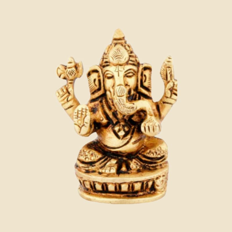 Brass Ganesha on Drum Base on a warm ivory background