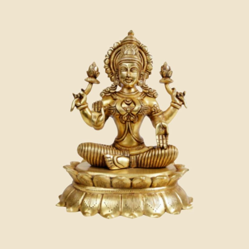 Brass Lakshmi on Lotus Pedestal on a warm ivory background