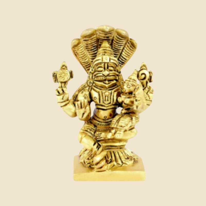 Brass Narasimha under Serpent Hood on a warm ivory background