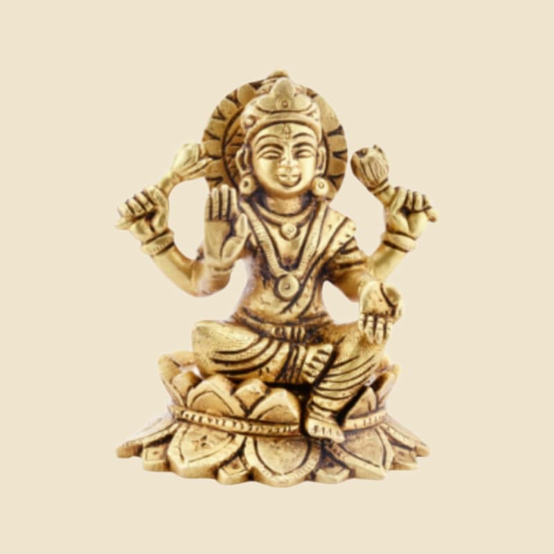 Brass Lakshmi on Lotus with Halo on a warm ivory background