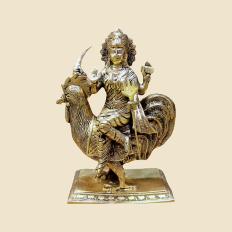 Brass Goddess on Rooster (Bahuchara Mata) on a warm ivory background