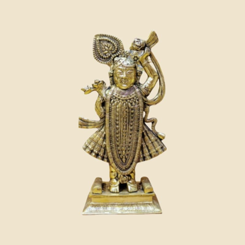 Brass Shrinathji on a warm ivory background