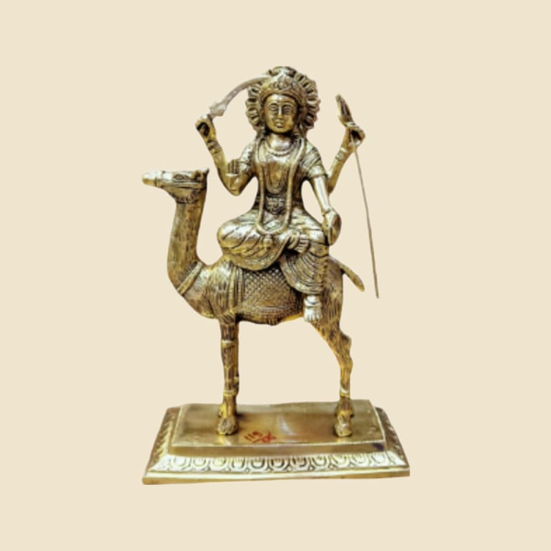 Brass Goddess on Camel on a warm ivory background