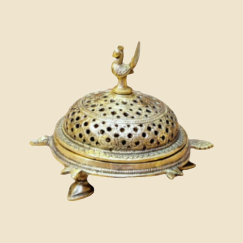 Brass Dome Incense Burner with Bird Finial on a warm ivory background