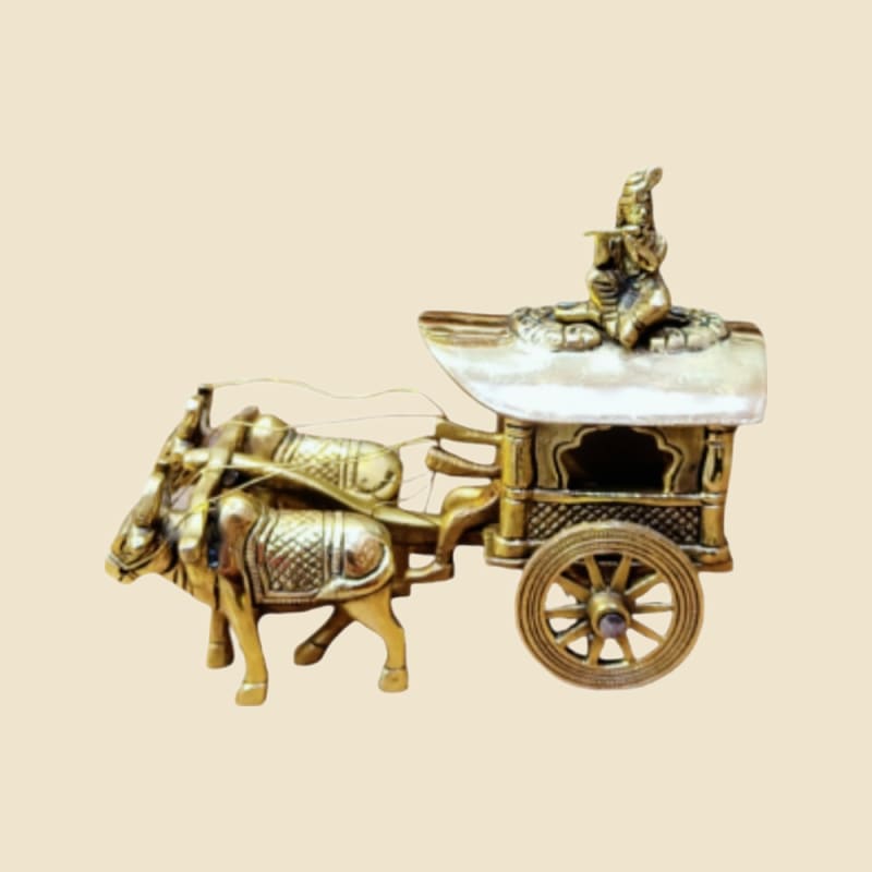 Brass Bullock Cart with Canopy and Krishna on a warm ivory background
