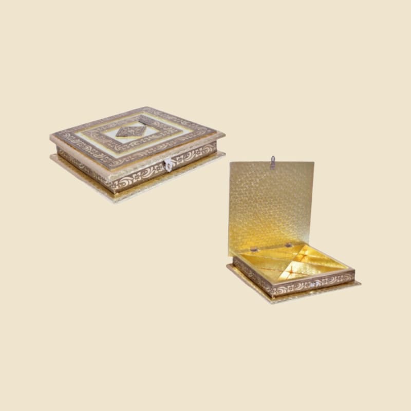 Silver Embossed Box on a warm ivory background