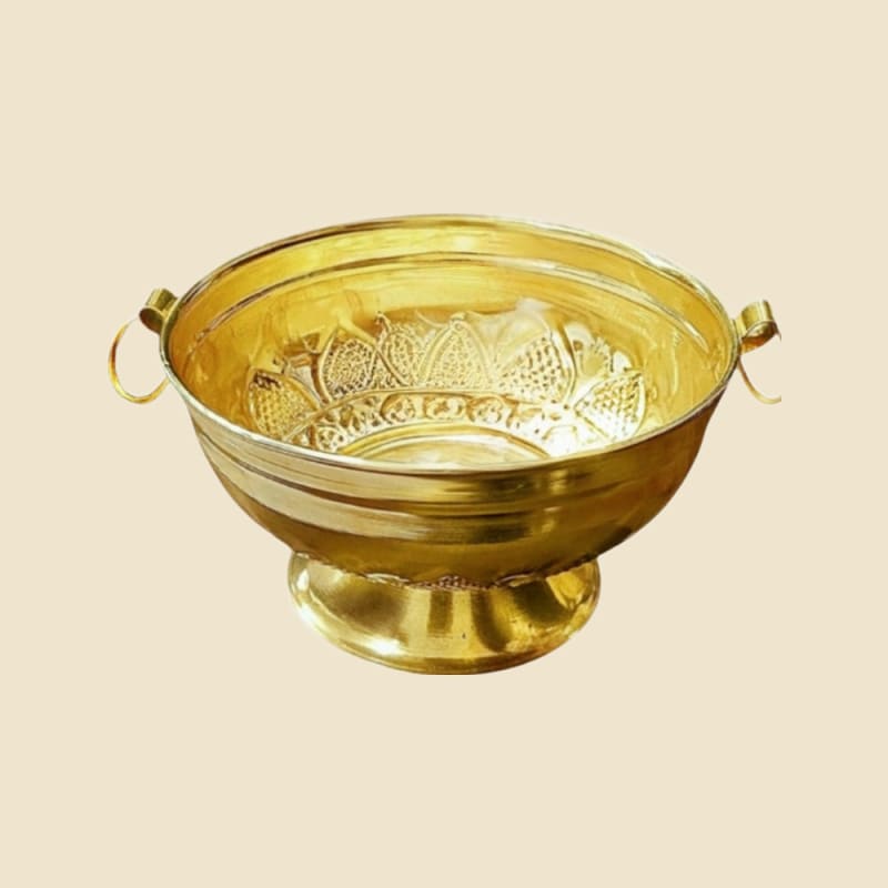 Brass Nakshi Flower Gangal on a warm ivory background