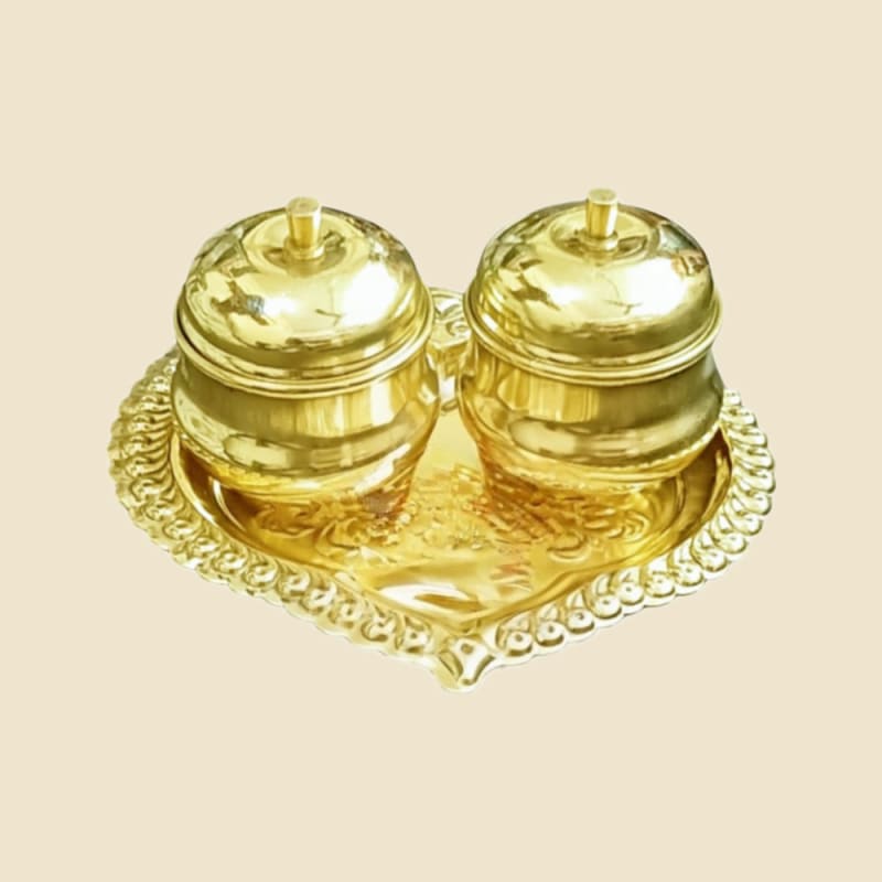 Brass Heart Kum Kum Plate on a warm ivory background