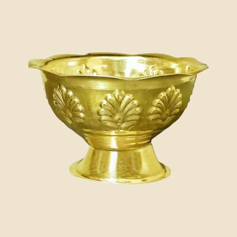 Brass Chandanam Cup Nakshi on a warm ivory background
