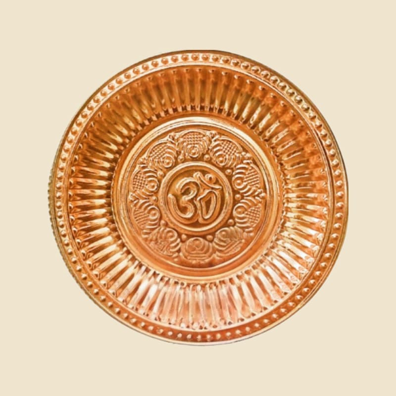 Copper Fancy Om Plate on a warm ivory background
