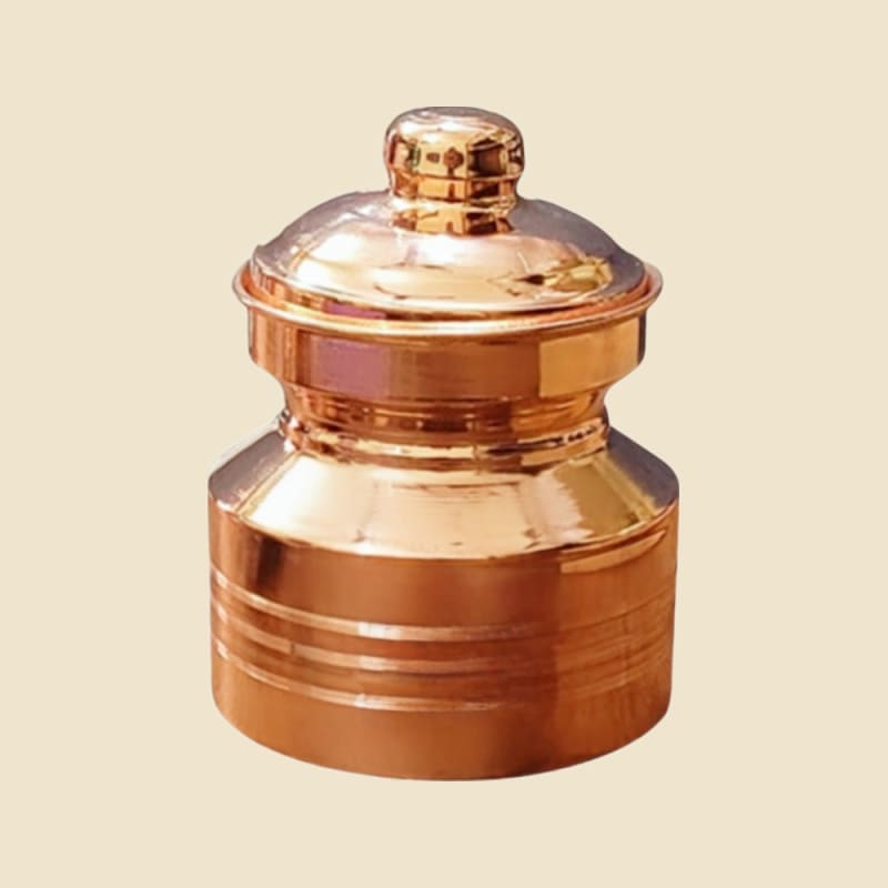 Copper Gangajal Loti on a warm ivory background