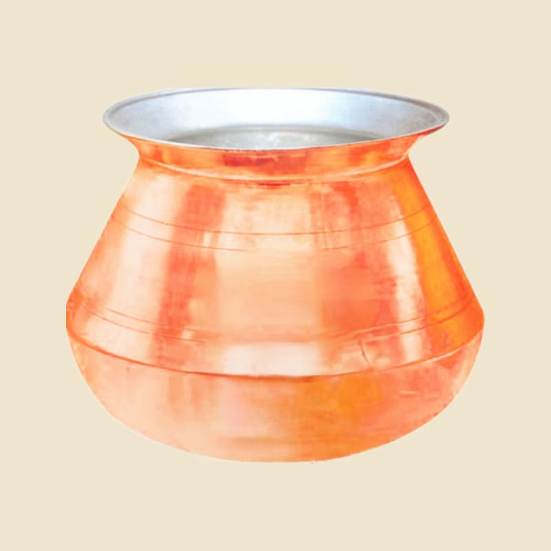 Copper Kalai Degchi on a warm ivory background