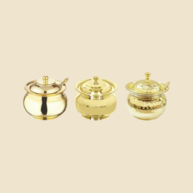 Brass Ghee Loti on a warm ivory background