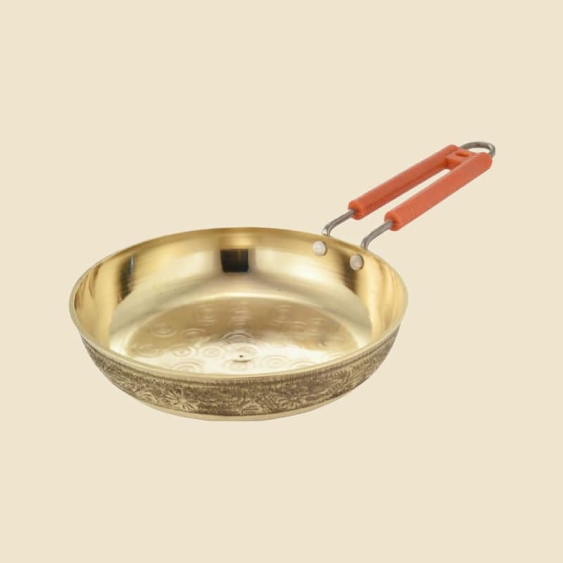 Brass Etched Tawa on a warm ivory background