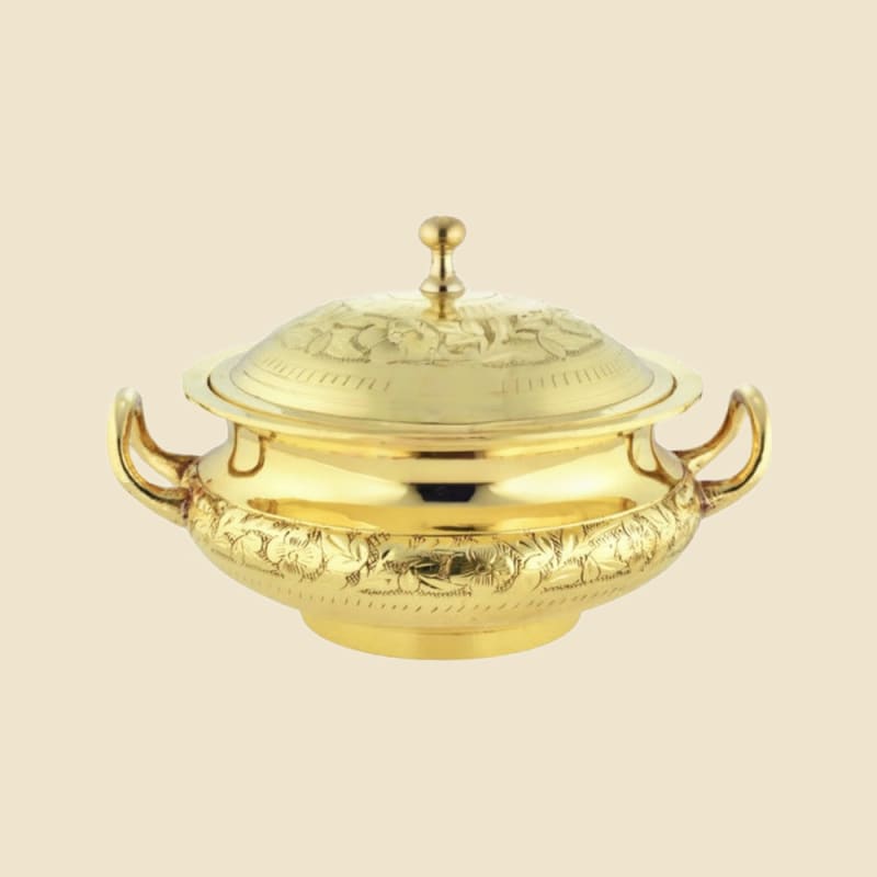Brass Donga English on a warm ivory background