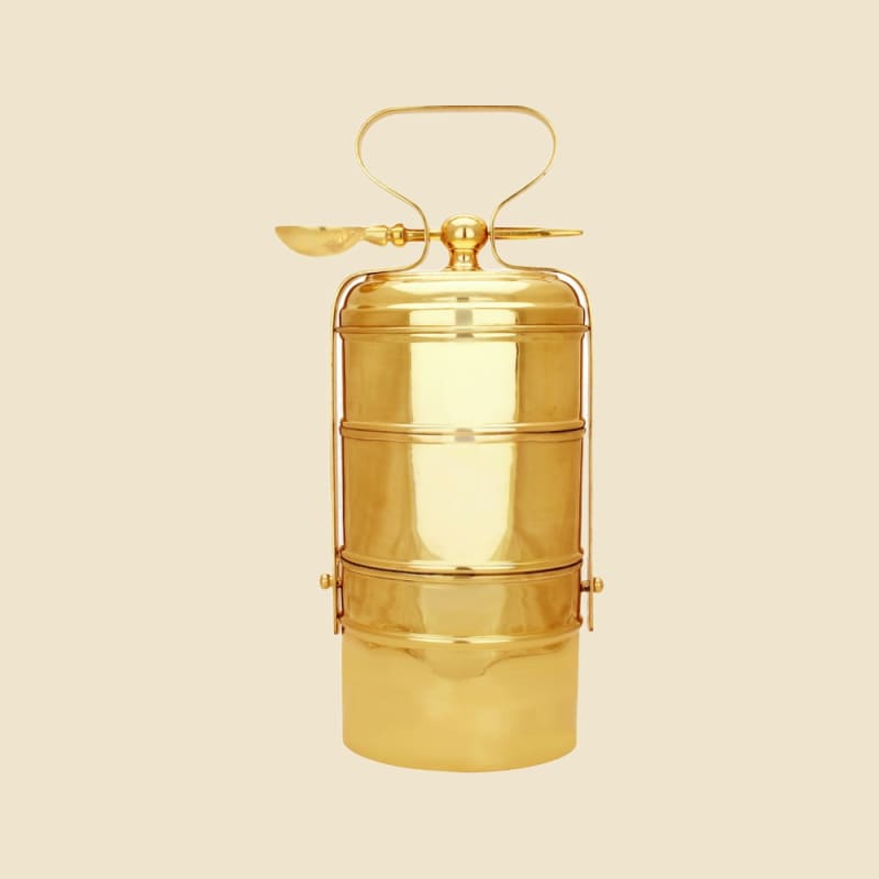 Brass Russian Tiffin on a warm ivory background