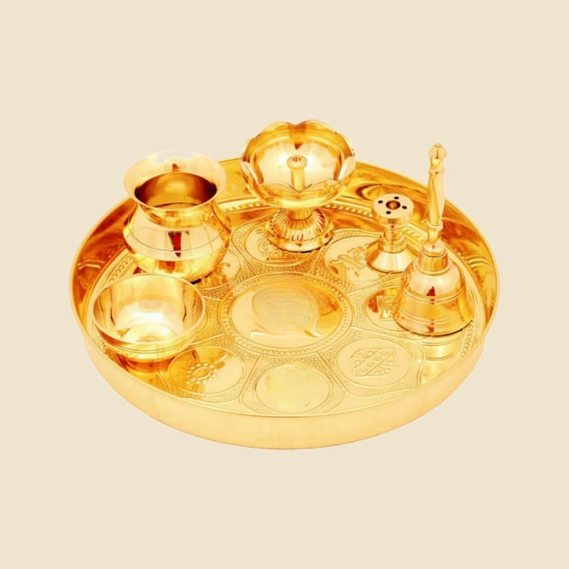 Asthamangal Brass Puja Thali Set on a warm ivory background