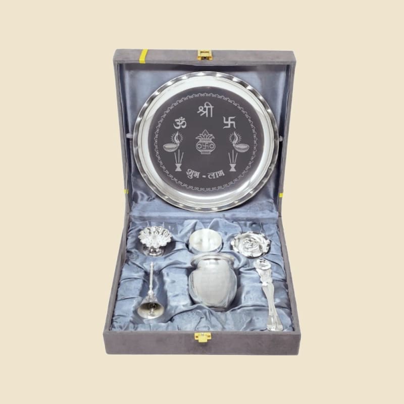 Shree Om Swastik Silver Puja Plate Set in Grey Box on a warm ivory background