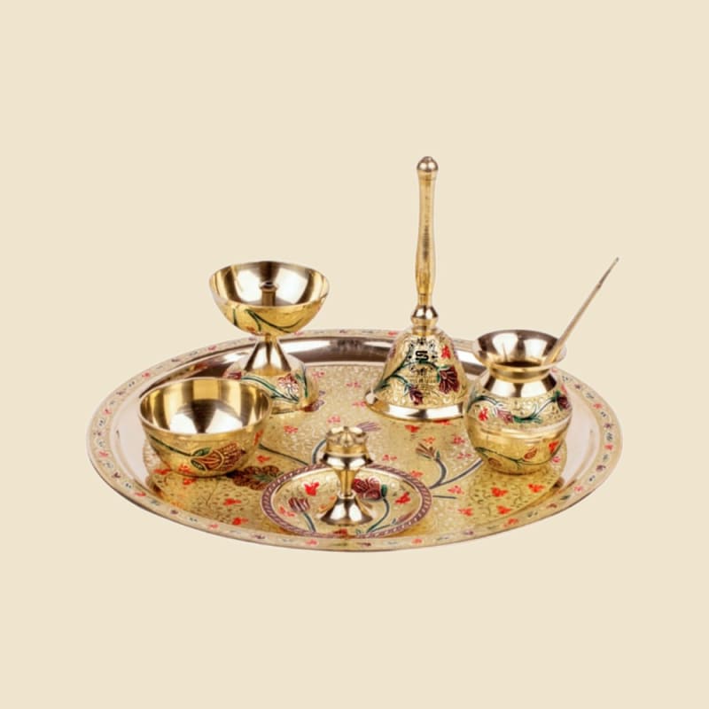 Meenakari Brass Puja Thali Set on a warm ivory background