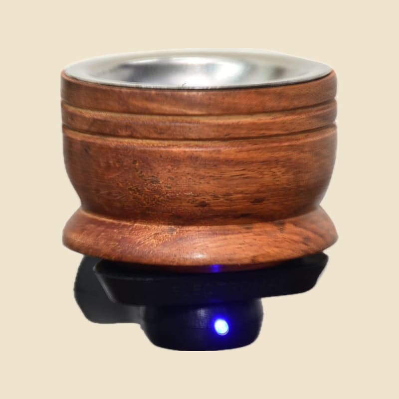 Wooden Electric Aroma Burner on a warm ivory background