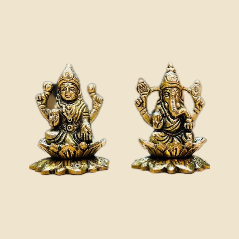 Brass Kamal Laxmi Ganesh Murti, Special Finish on a warm ivory background