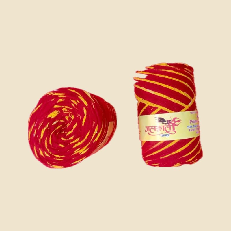 Moli (Kalawa) Sacred Thread Rolls on a warm ivory background