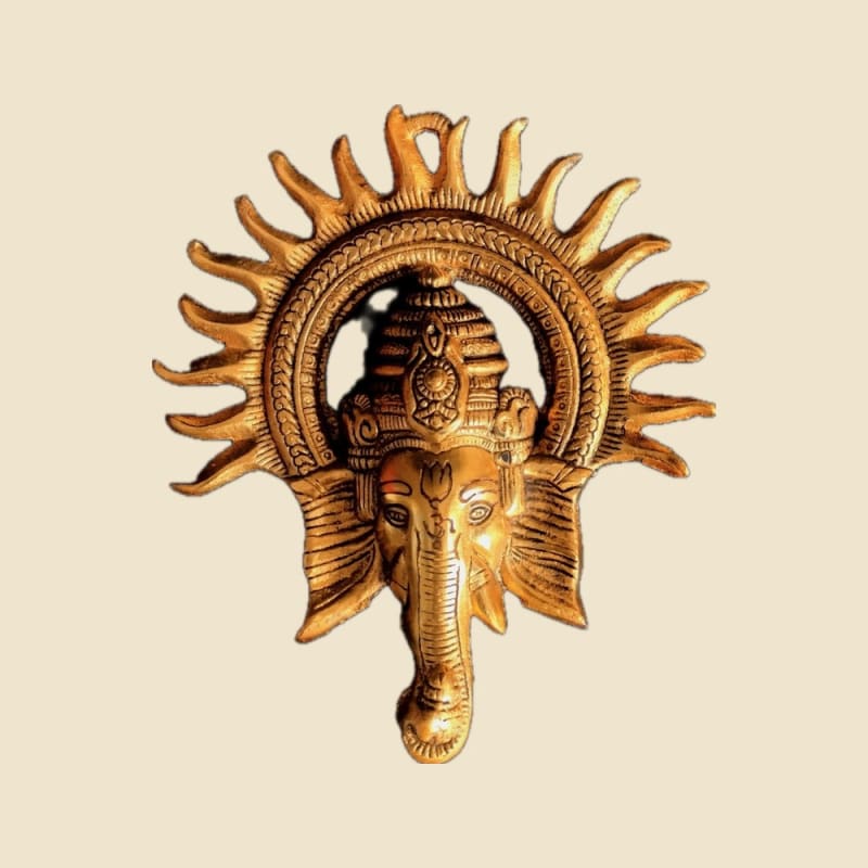 Sun Ganesha Wall Hanging on a warm ivory background