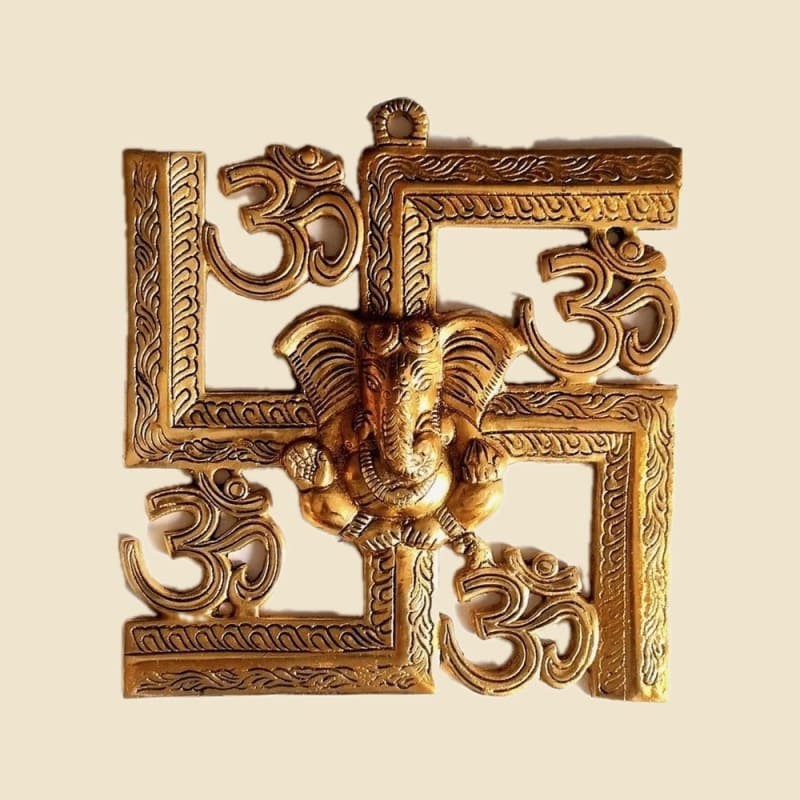 Swastik Om Ganesha Wall Hanging on a warm ivory background